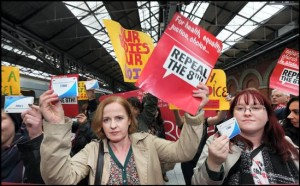 A GROUP of pro-choice campaigners took banned abortion pills after travelling over the Border by train to collect them from the North.