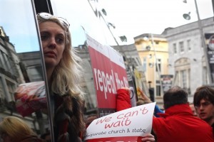 A pro-choice campaigner looks out from the "abortion pill bus." (Photo by Sally Hayden/VICE News)